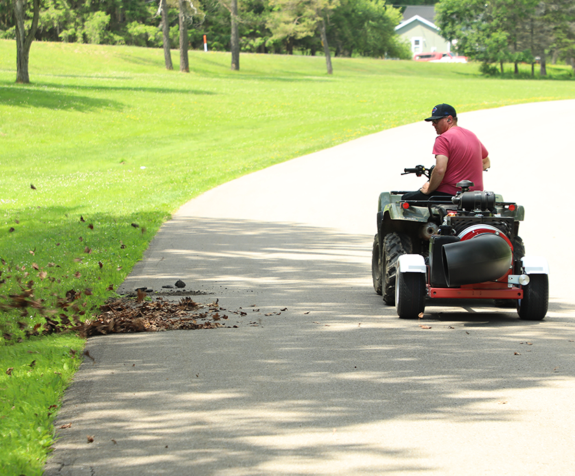 Buffalo Turbine MEGA3 municipal debris blower clearing paved trail